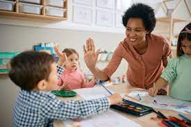 Elementary school classroom with teacher and students