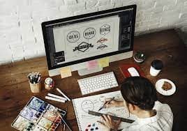 Graphic design students working on a project together