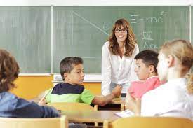 Middle school teacher in classroom