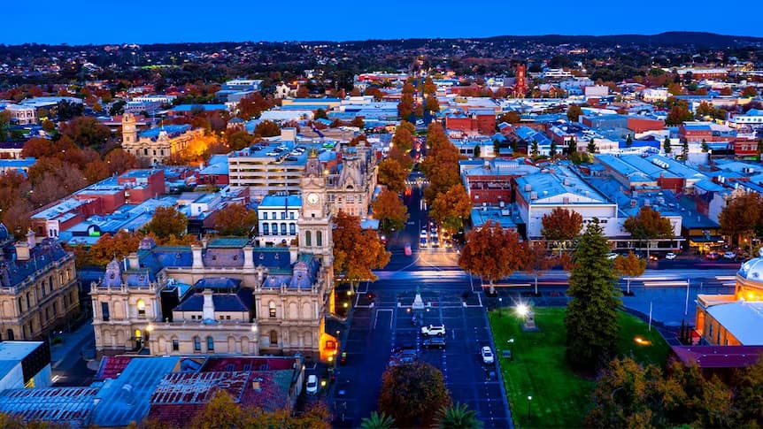 Academic Jobs Bendigo skyline showcasing its historic architecture and lush greenery