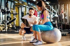 Athletic training students working out