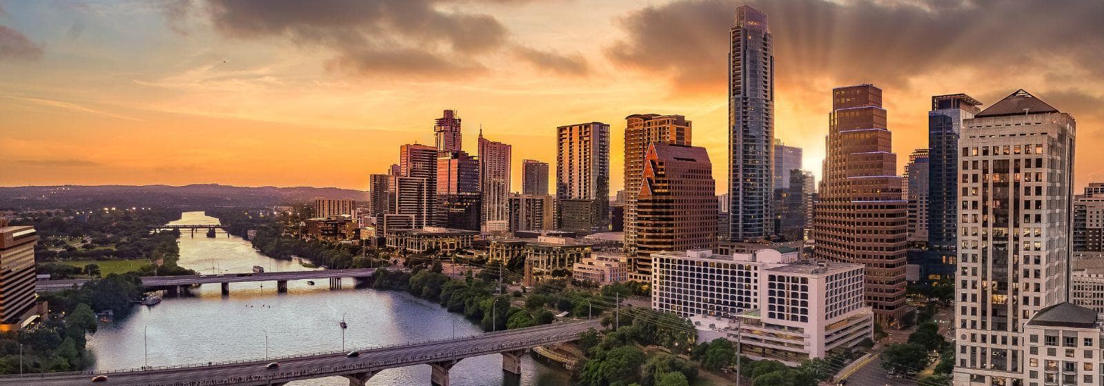 Panoramic view of Austin showcasing the University of Texas campus amidst the city's bustling cultural and technological hubs