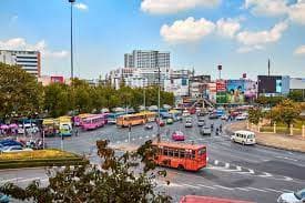 The bustling cityscape of Bangalore, juxtaposed with its serene educational campuses, illustrates the city's unique blend of technological advancement and academic heritage.