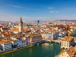 Academic Jobs Aerial view of Zurich, showcasing its educational institutions and beautiful scenery