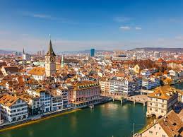 Academic Jobs Aerial view of Zurich, showcasing its educational institutions and beautiful scenery